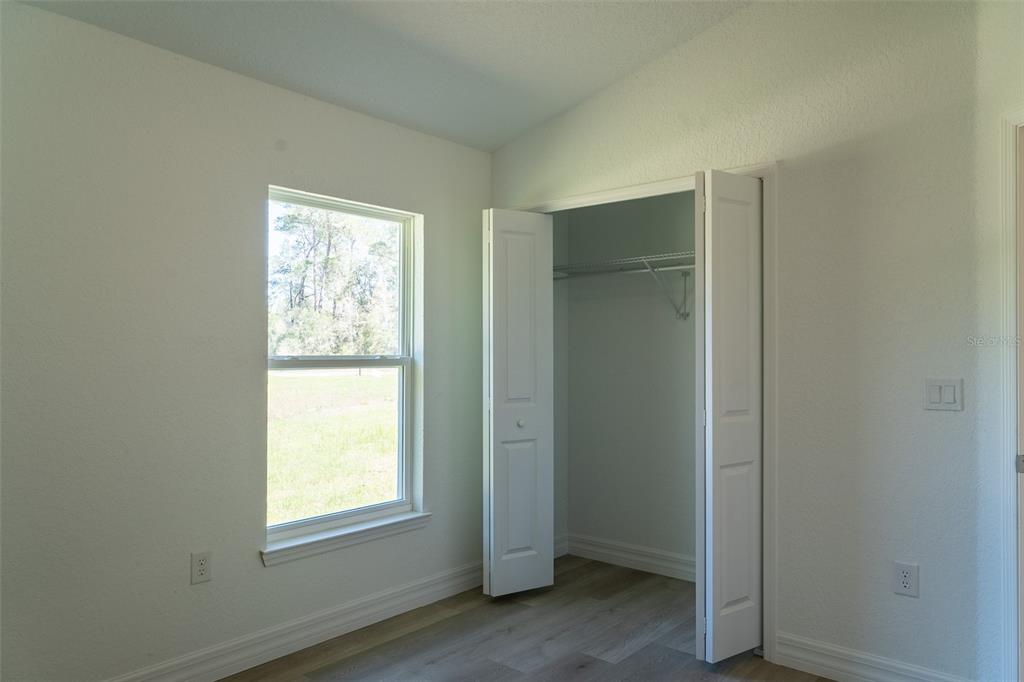 17820 Southwest 33rd Terrace Ocala, FL 34473 - Photo 33 of 35 an empty room with windows