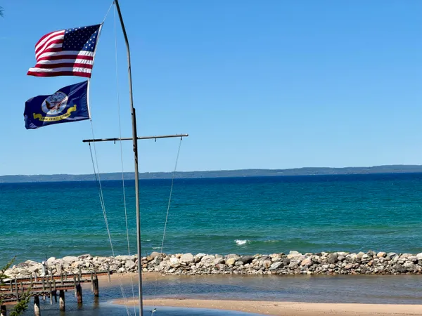 $2,200,000 | 724 South Golden Beach Drive, Unit LOT: 14, Kewadin, MI 49648