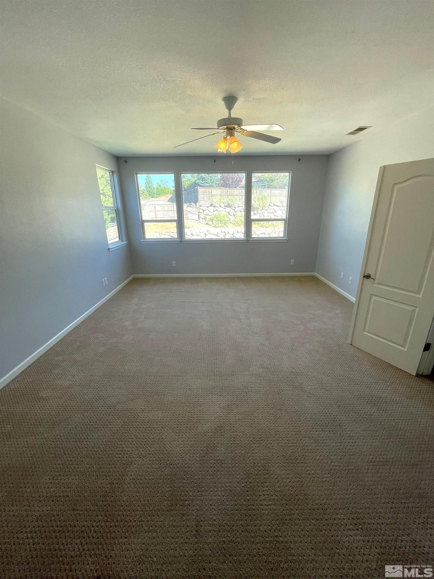 3660 Sienna Pointe Court Reno, NV 89512 - Photo 13 of 24 a view of an empty room with a window