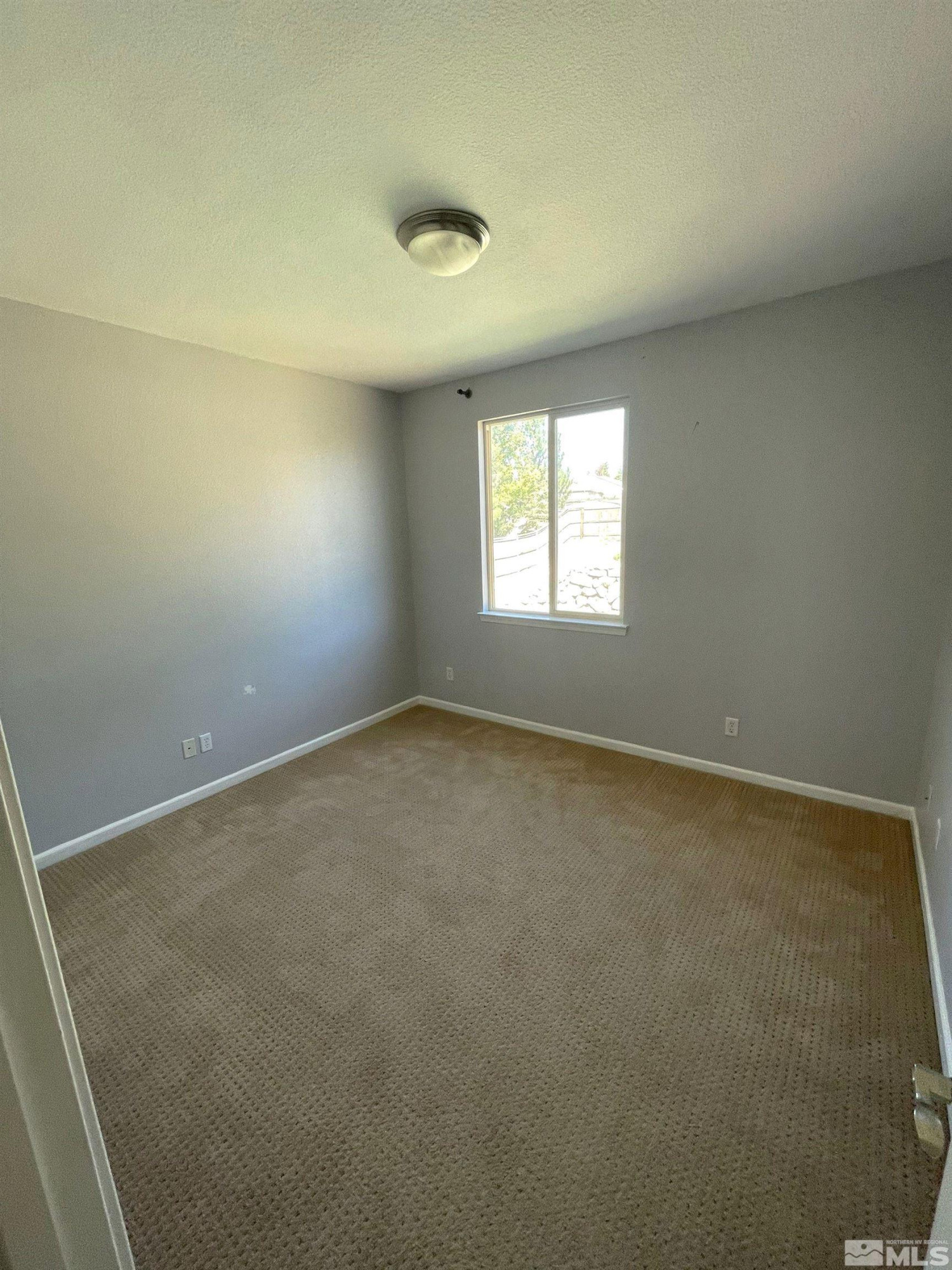 3660 Sienna Pointe Court Reno, NV 89512 - Photo 19 of 24 an empty room with a window