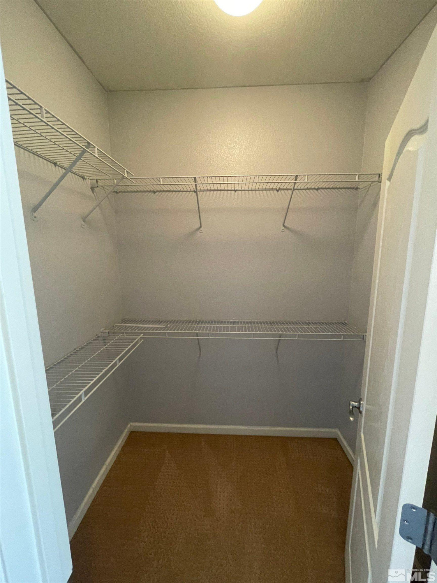 3660 Sienna Pointe Court Reno, NV 89512 - Photo 22 of 24 a view of a room with racks on the wall