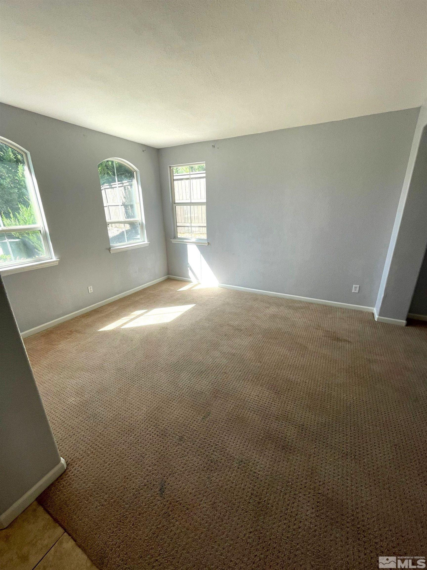 3660 Sienna Pointe Court Reno, NV 89512 - Photo 8 of 24 an empty room with windows
