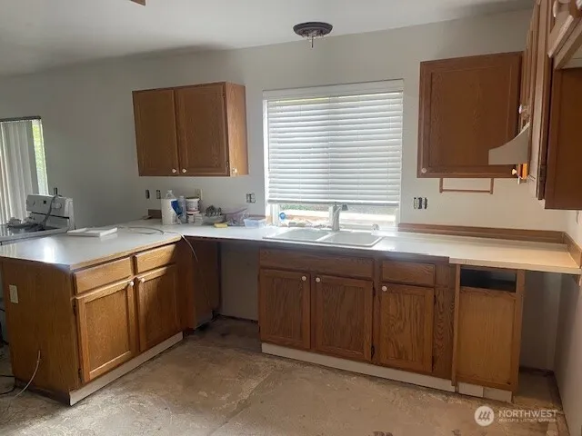 a bathroom with a sink double vanity and a mirror