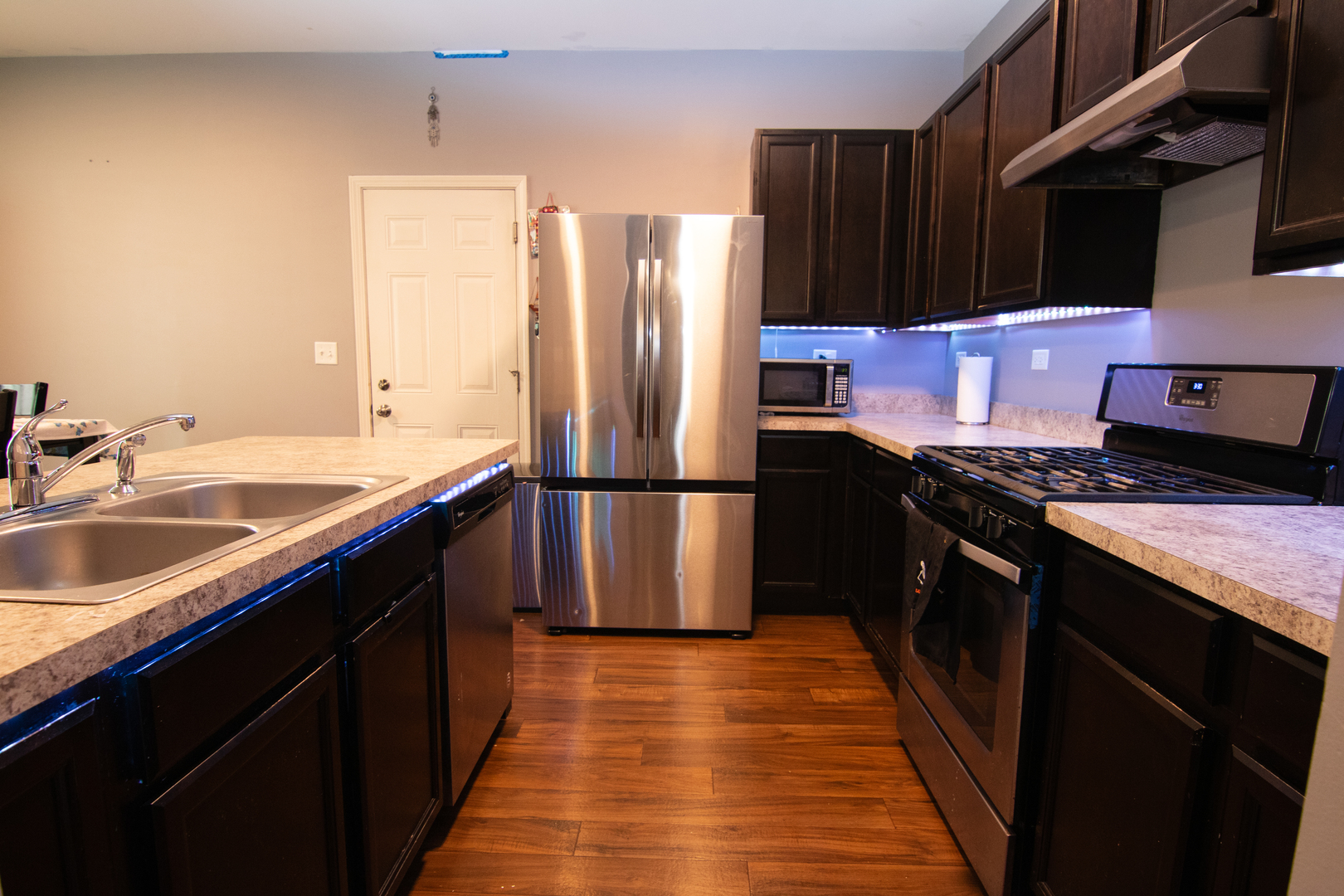 3619 Daisy Lane Elgin, IL 60124 - Photo 13 of 28 a kitchen with stainless steel appliances granite countertop a refrigerator a sink and a stove