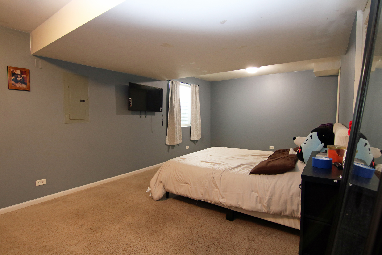 3619 Daisy Lane Elgin, IL 60124 - Photo 24 of 28 a bedroom with a bed and a flat screen tv
