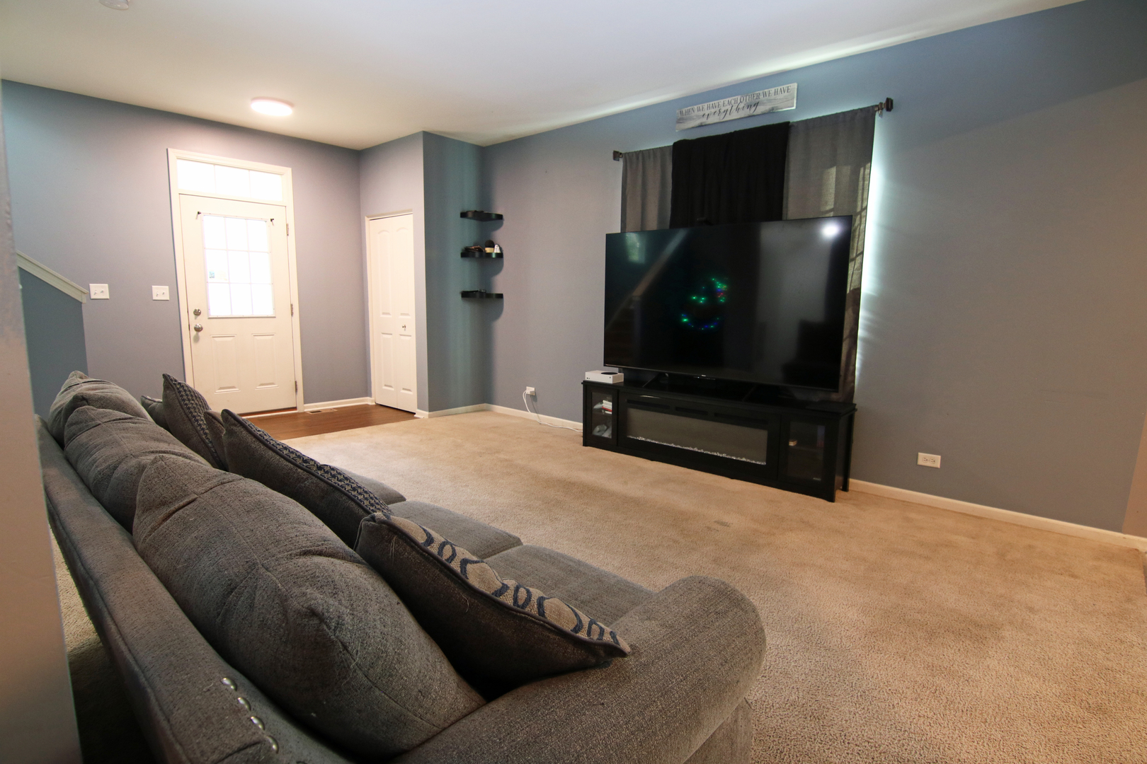 3619 Daisy Lane Elgin, IL 60124 - Photo 7 of 28 a living room with furniture and a flat screen tv