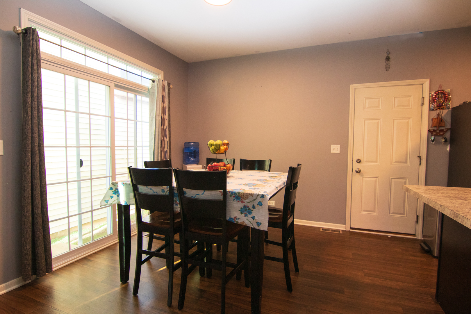 3619 Daisy Lane Elgin, IL 60124 - Photo 9 of 28 a view of a dining room with furniture and wooden floor