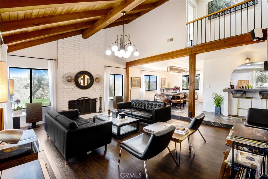 17295 Ridge Canyon Drive Riverside, CA 92506 - Photo 12 of 53 a living room with furniture kitchen view and a large window