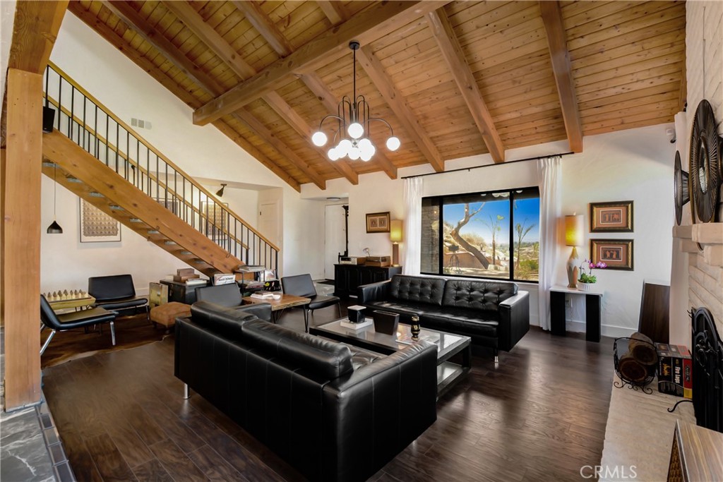 17295 Ridge Canyon Drive Riverside, CA 92506 - Photo 13 of 53 a living room with furniture flat screen tv and a fireplace