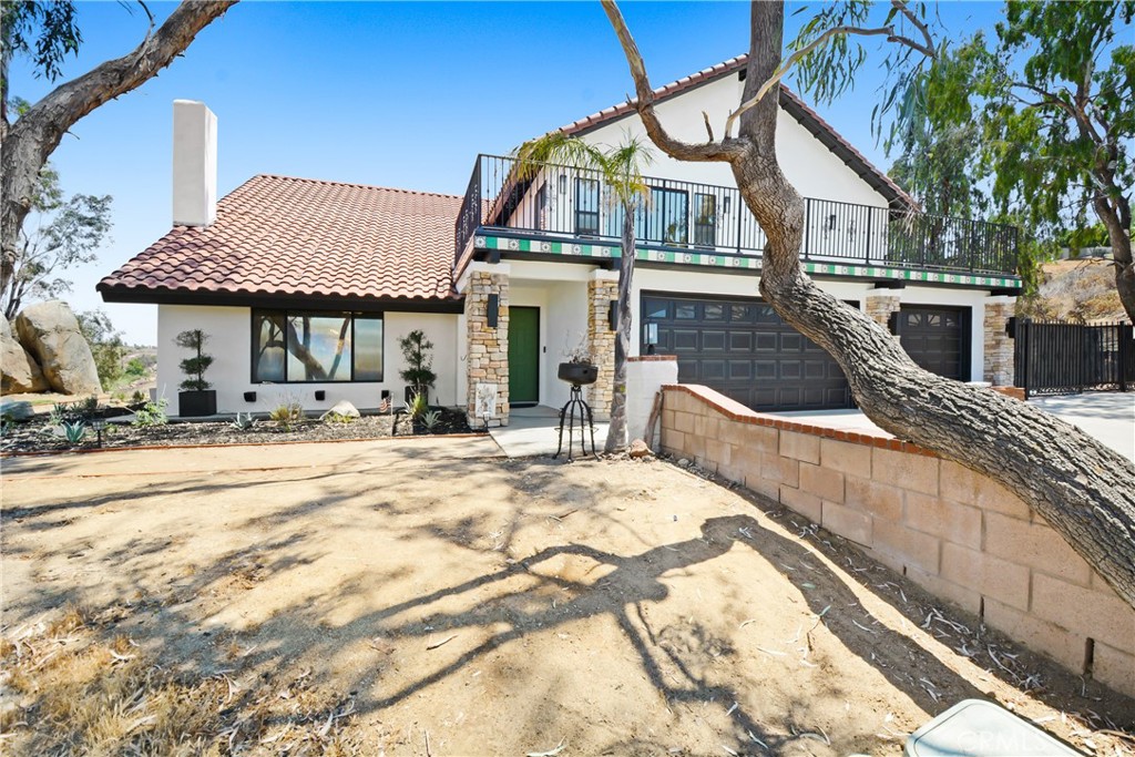 17295 Ridge Canyon Drive Riverside, CA 92506 - Photo 2 of 53 a view of a house with backyard and kitchen