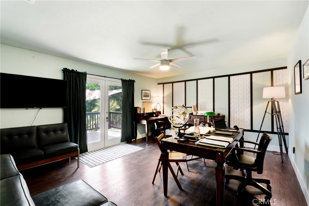 17295 Ridge Canyon Drive Riverside, CA 92506 - Photo 22 of 53 a living room with furniture a rug and a floor to ceiling window