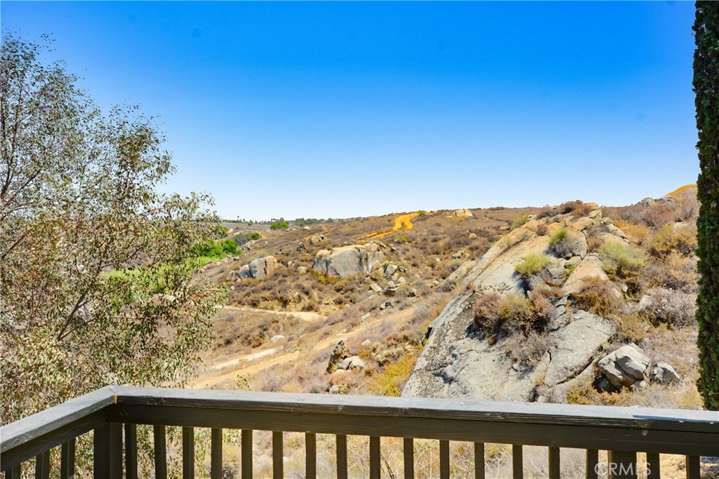 17295 Ridge Canyon Drive Riverside, CA 92506 - Photo 25 of 53 a view of a mountain from a balcony