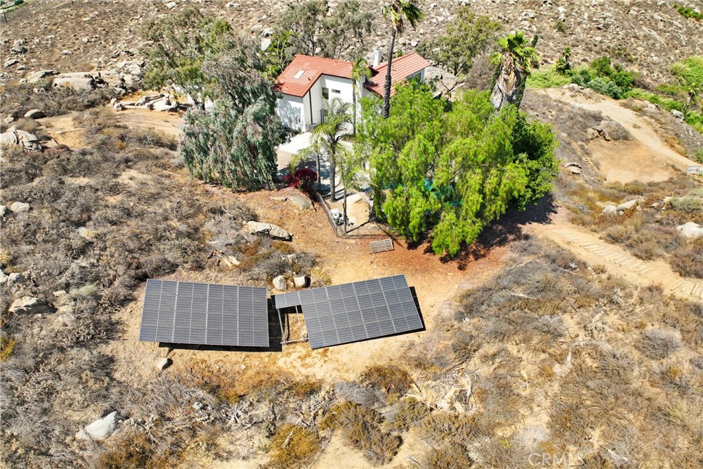 17295 Ridge Canyon Drive Riverside, CA 92506 - Photo 49 of 53 an aerial view of a house with a yard and trees all around