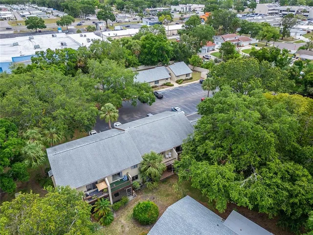 an aerial view of a house with a garden