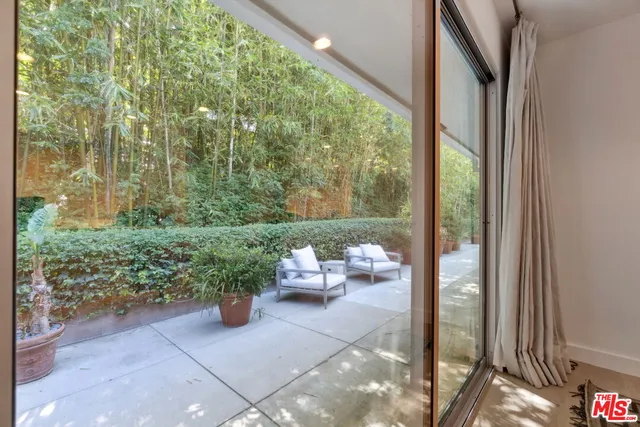 a view of sitting area with furniture and garden