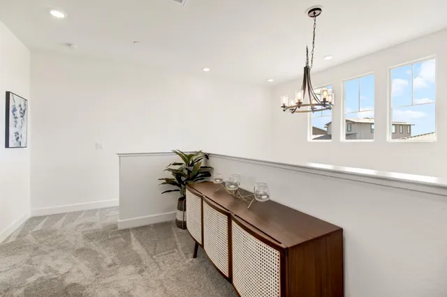 a balcony with furniture and city view