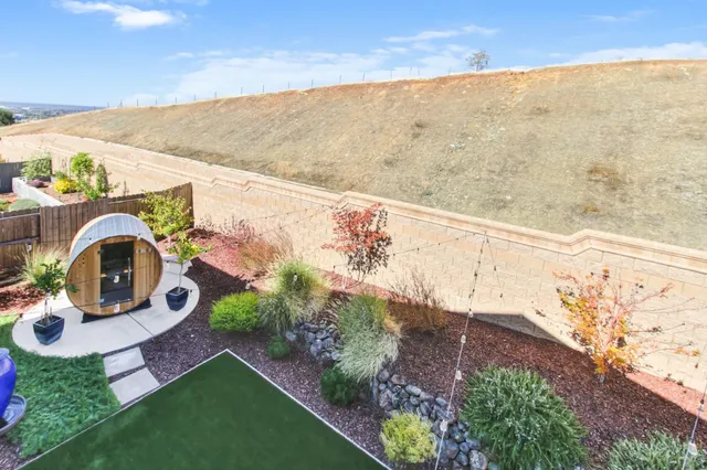 a en suite spacious bathroom with a tub shower and bedroom