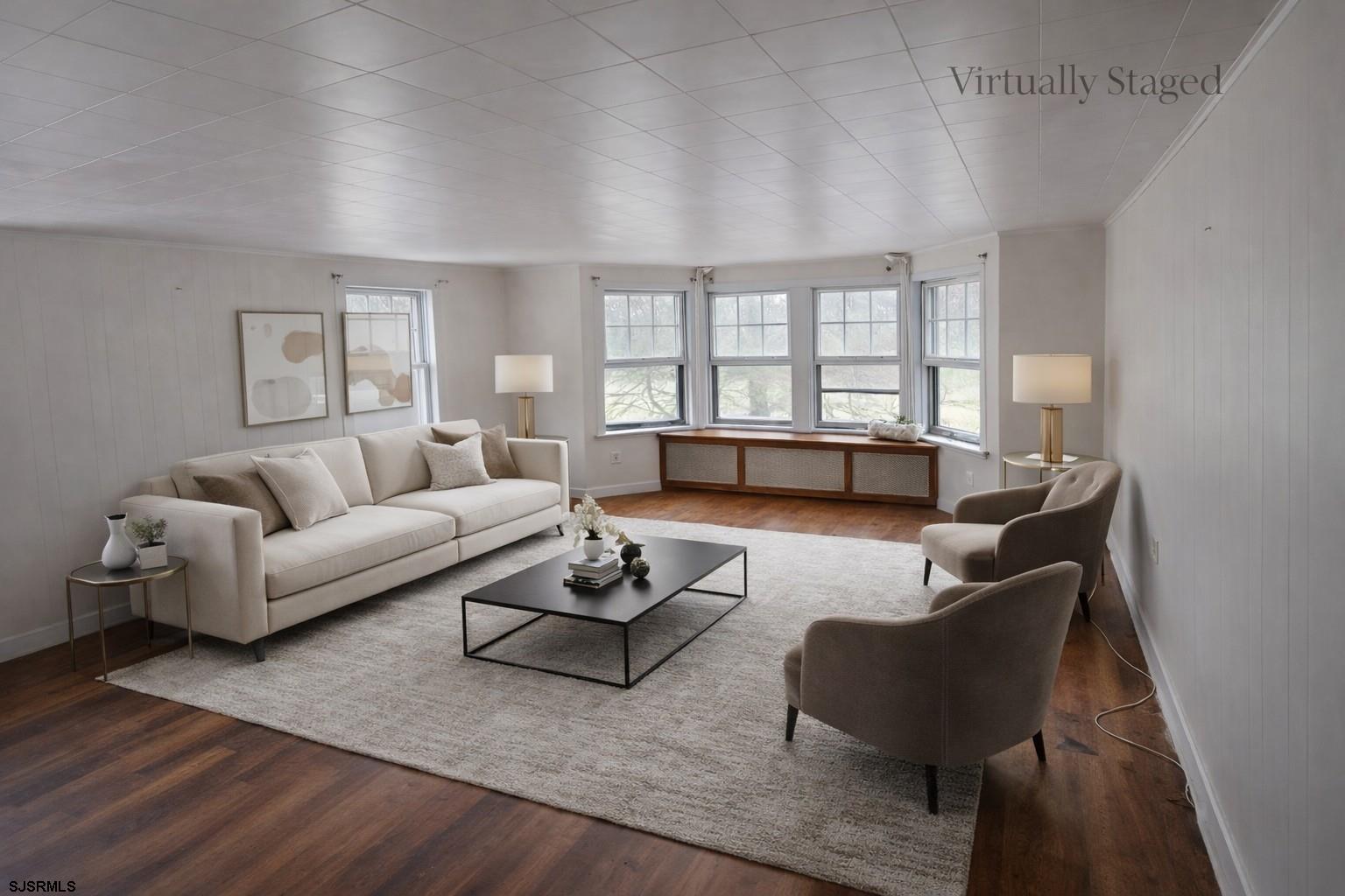 639 Chestnut Neck Road Port Republic, NJ 08241 - Photo 2 of 26 a living room with furniture and a large window