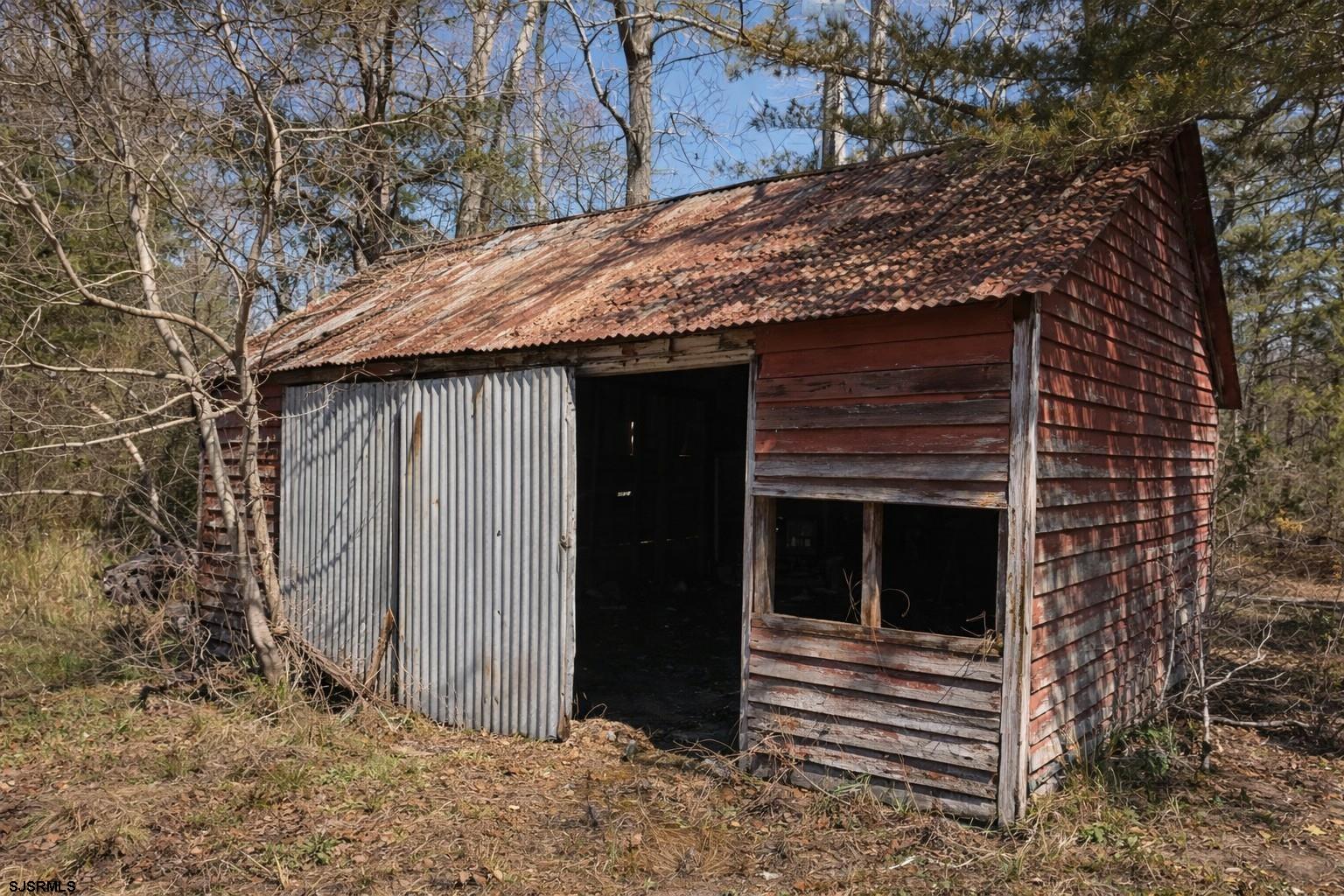 639 Chestnut Neck Road Port Republic, NJ 08241 - Photo 25 of 26 a backyard of a house
