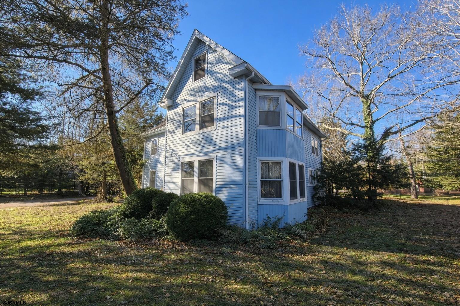 639 Chestnut Neck Road Port Republic, NJ 08241 - Photo 4 of 26 a view of a house with a yard