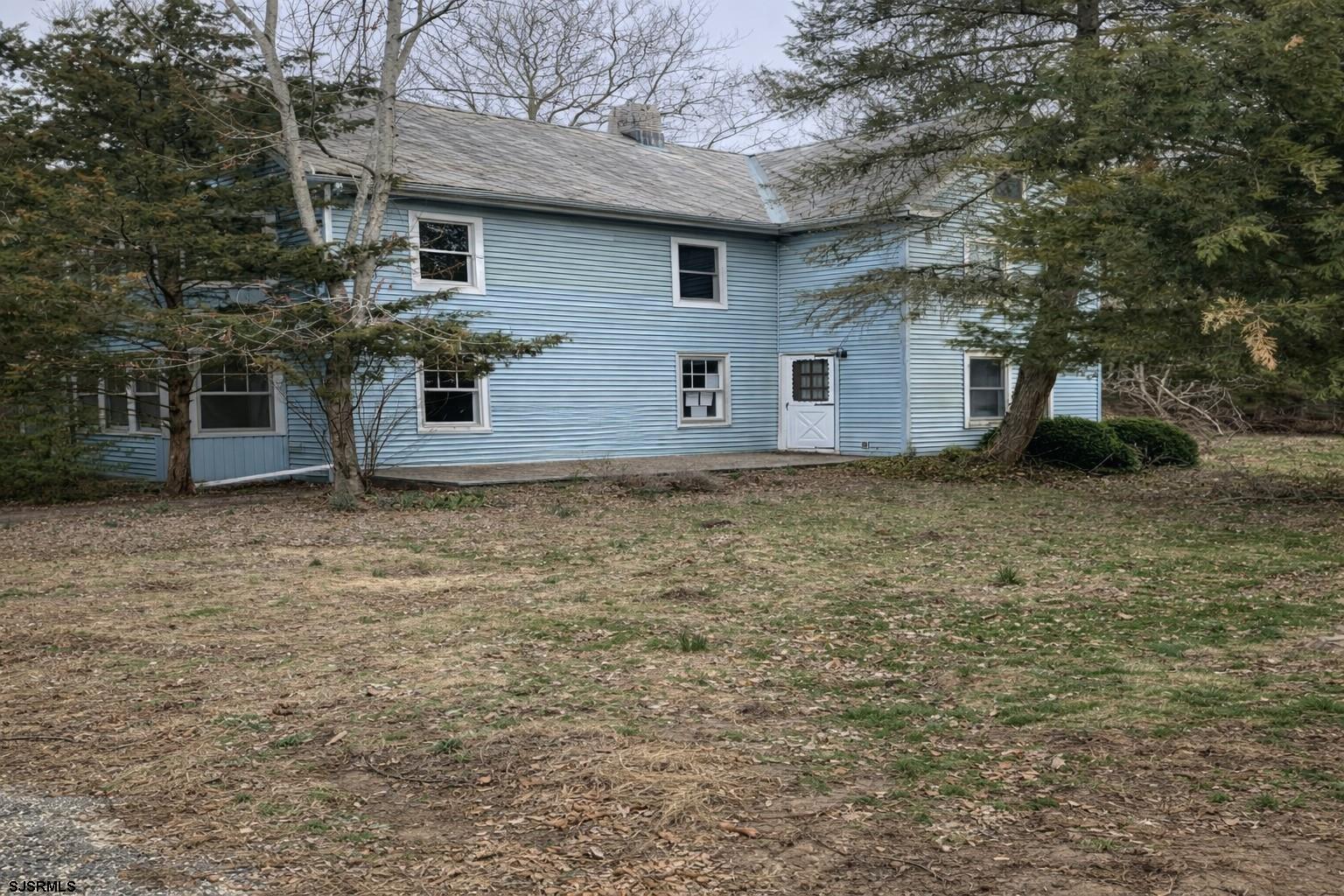 639 Chestnut Neck Road Port Republic, NJ 08241 - Photo 5 of 26 a front view of house with yard