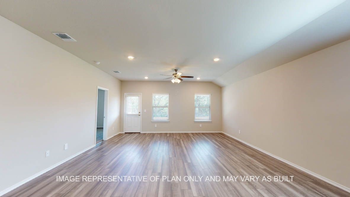 3017 Taddy Road Lorena, TX 76655 - Photo 14 of 24 an empty room with wooden floor and windows