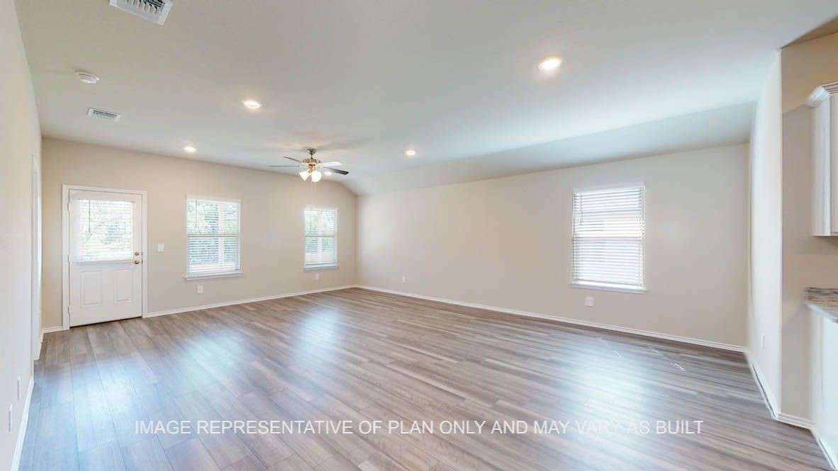 3017 Taddy Road Lorena, TX 76655 - Photo 15 of 24 an empty room with wooden floor and windows