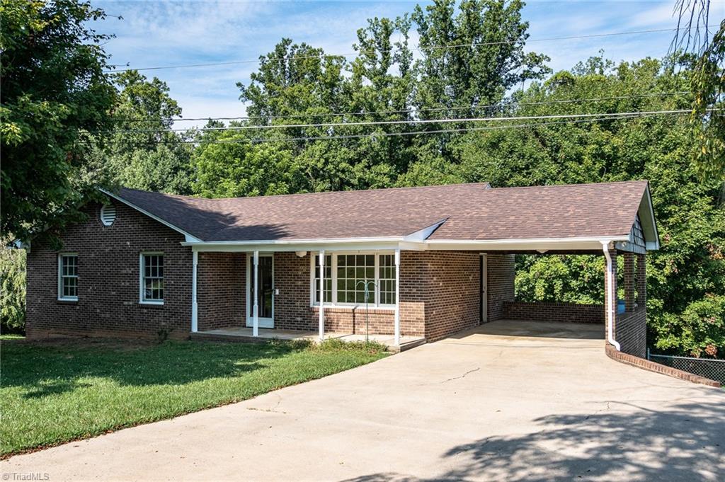 3575 Austin Traphill Road Elkin, NC 28621 - Photo 1 of 30 Brick ranch style home built in 1973 on 0.65 acres of land in Elkin, Wilkes County.