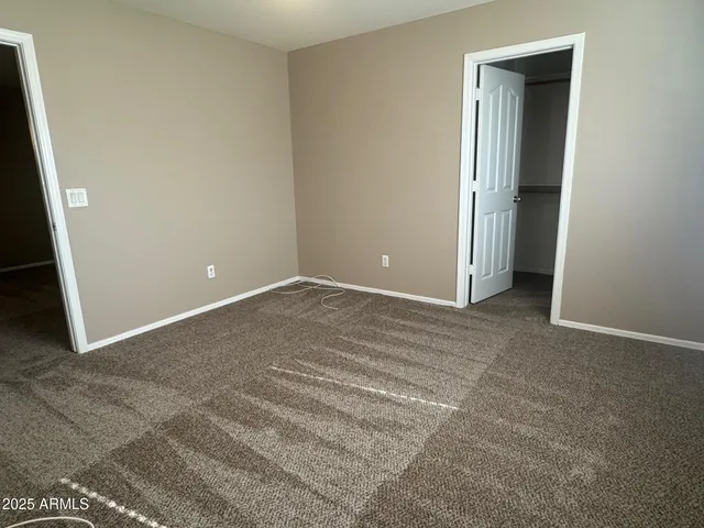 a view of a yard with plants and a trees