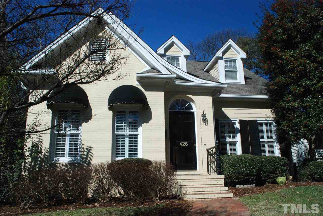 426 Morrison Avenue Raleigh, NC 27608 - Photo 1 of 25 a front view of a house with yard