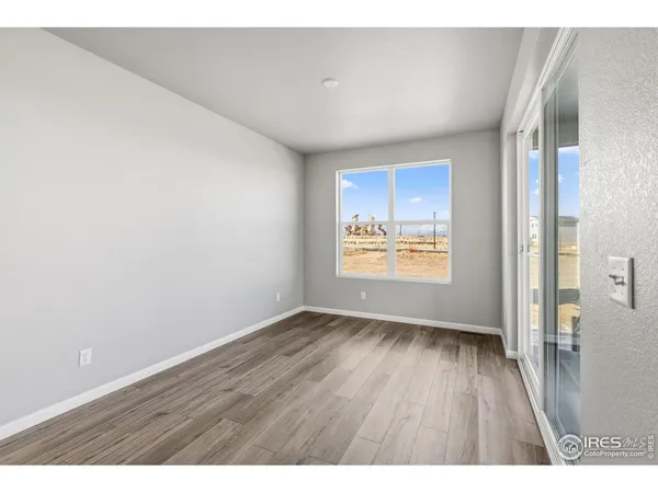 a view of an empty room and window