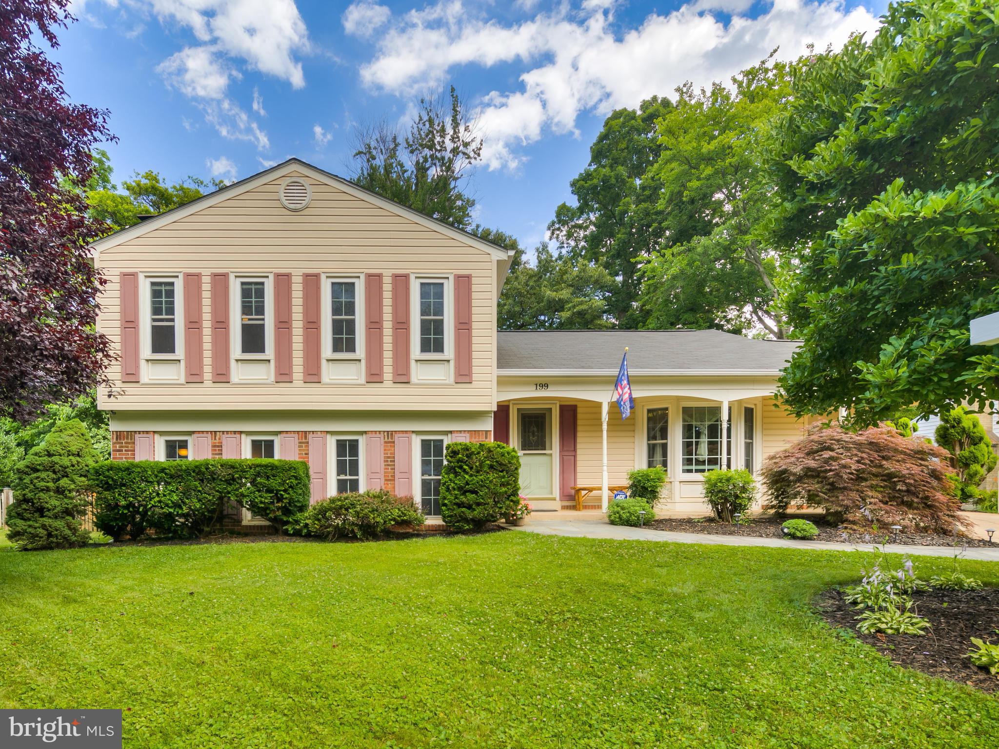 199 Summit Hall Road Gaithersburg, MD 20877 - Photo 1 of 30 front view of a house with a yard