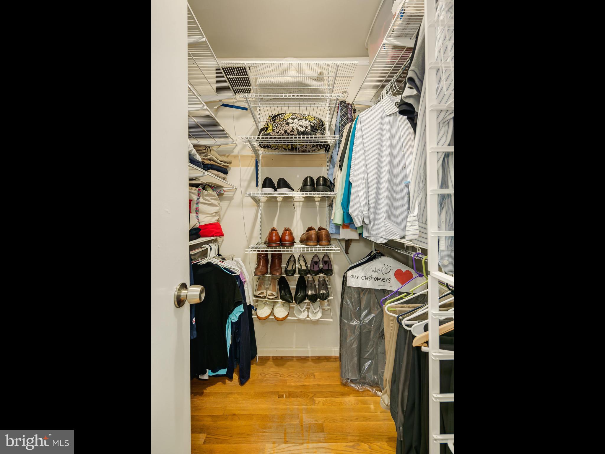 199 Summit Hall Road Gaithersburg, MD 20877 - Photo 13 of 30 a view of walk in closet with clothes and shoes