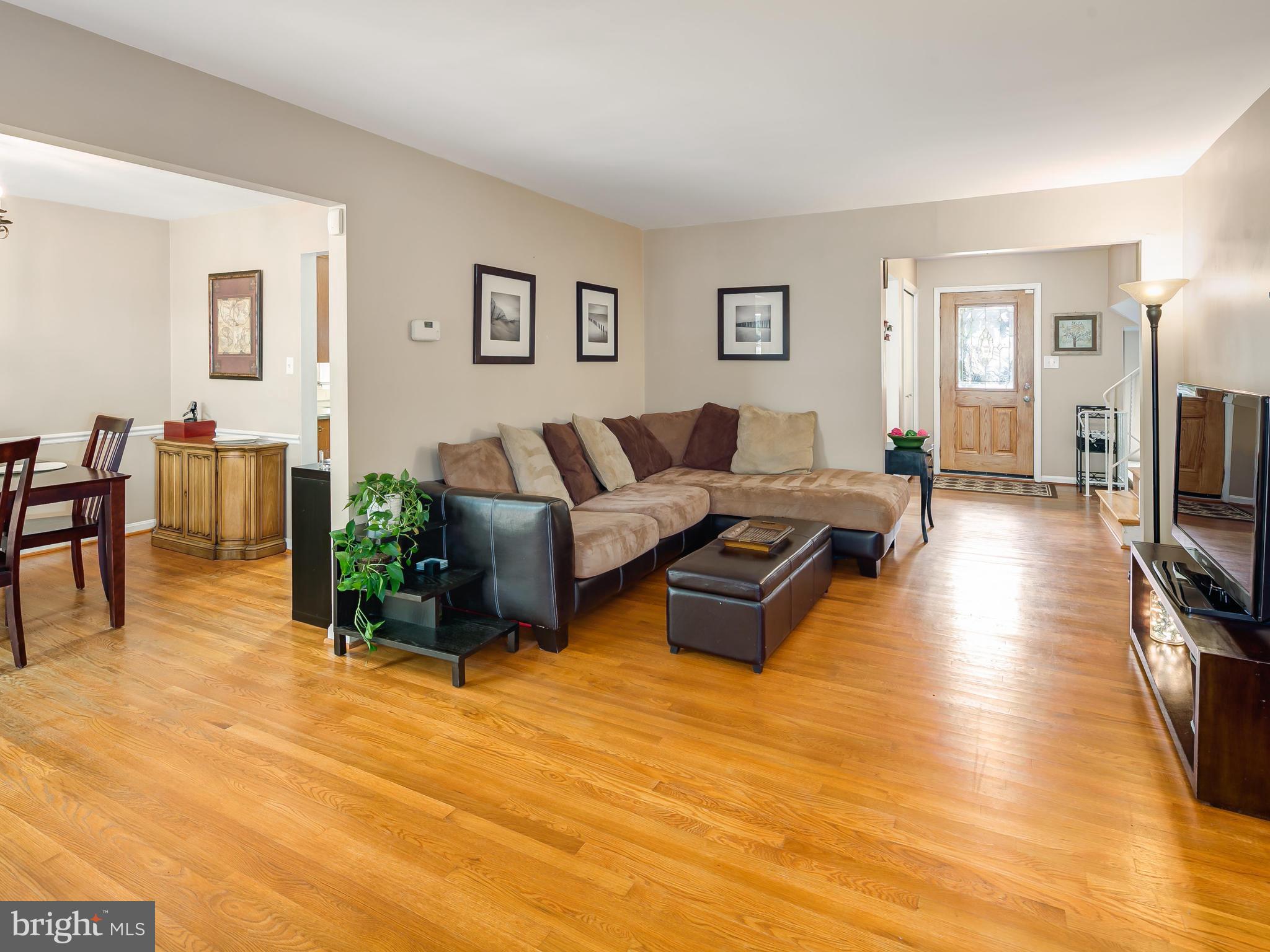 199 Summit Hall Road Gaithersburg, MD 20877 - Photo 5 of 30 a living room with furniture and a flat screen tv