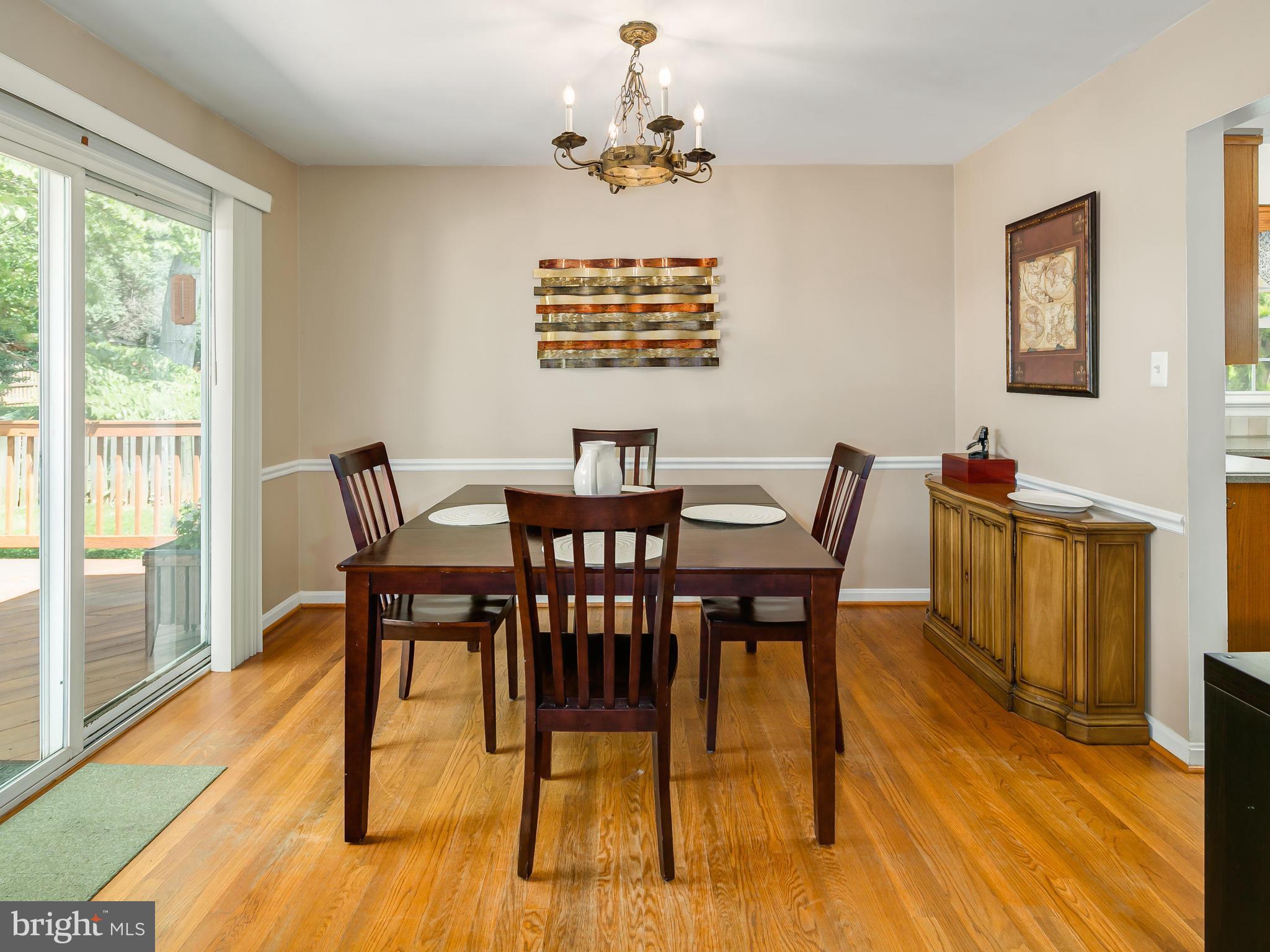 199 Summit Hall Road Gaithersburg, MD 20877 - Photo 6 of 30 a view of a dining room with furniture window and wooden floor