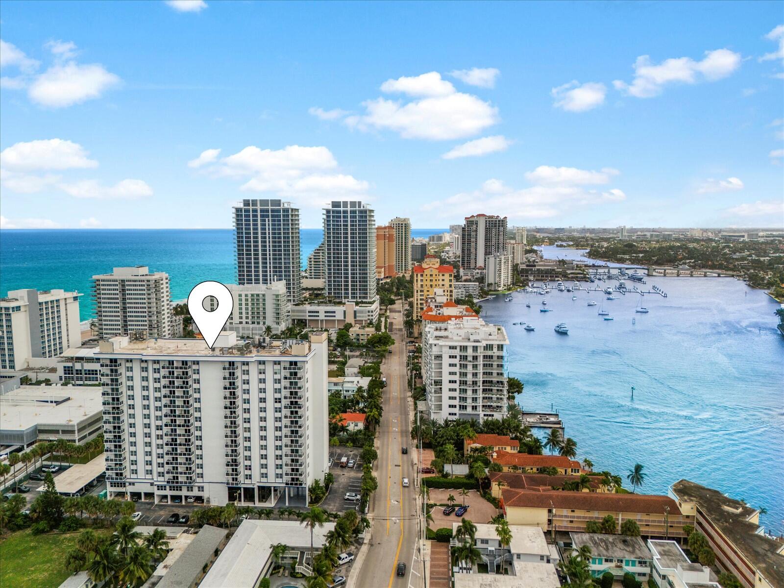 a view of city with ocean