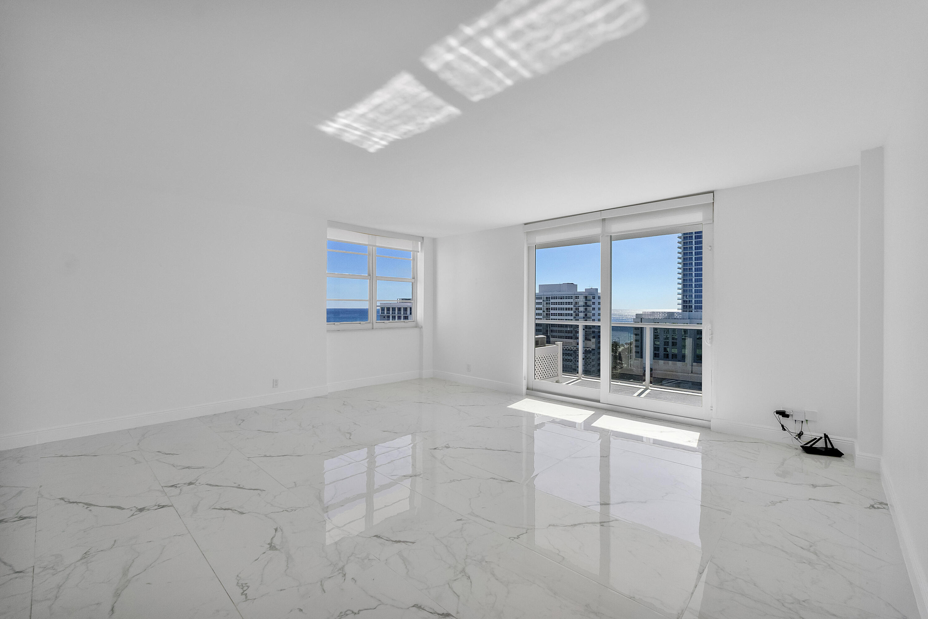 336 North Birch Road, Unit PHI Fort Lauderdale, FL 33304 - Photo 13 of 63 a view of an empty room with a window