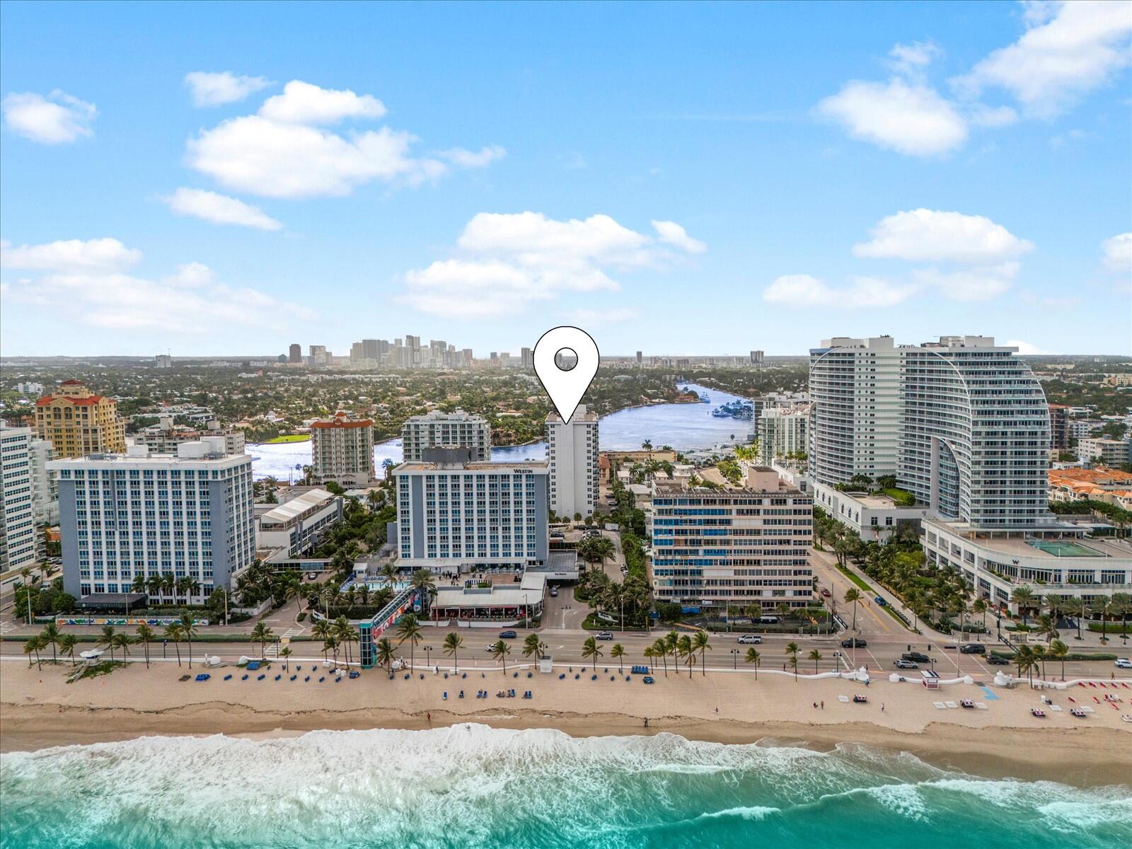 336 North Birch Road, Unit PHI Fort Lauderdale, FL 33304 - Photo 47 of 63 a view of a lake with a yard