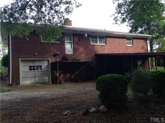 606 Ridge Road Roxboro, NC 27573 - Photo 6 of 6 a front view of a house with a yard