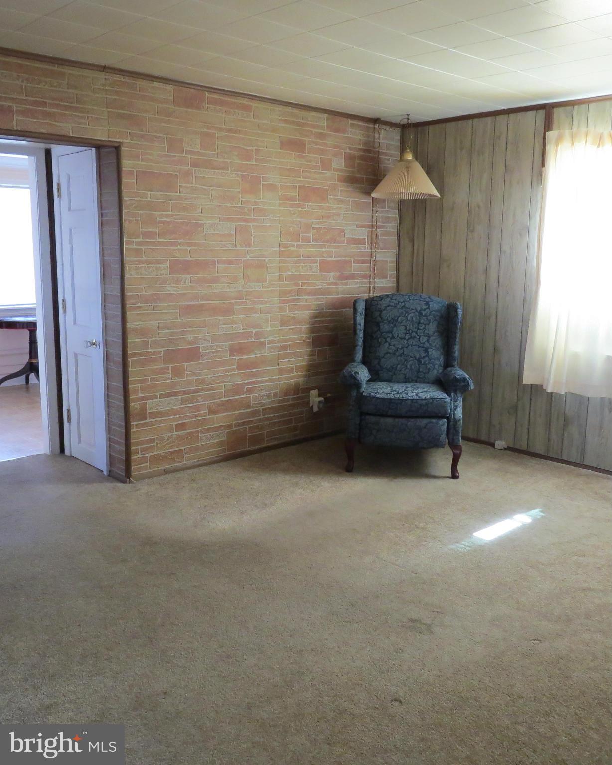 3401 Sollers Point Road Baltimore, MD 21222 - Photo 2 of 29 a view of livingroom with furniture and window