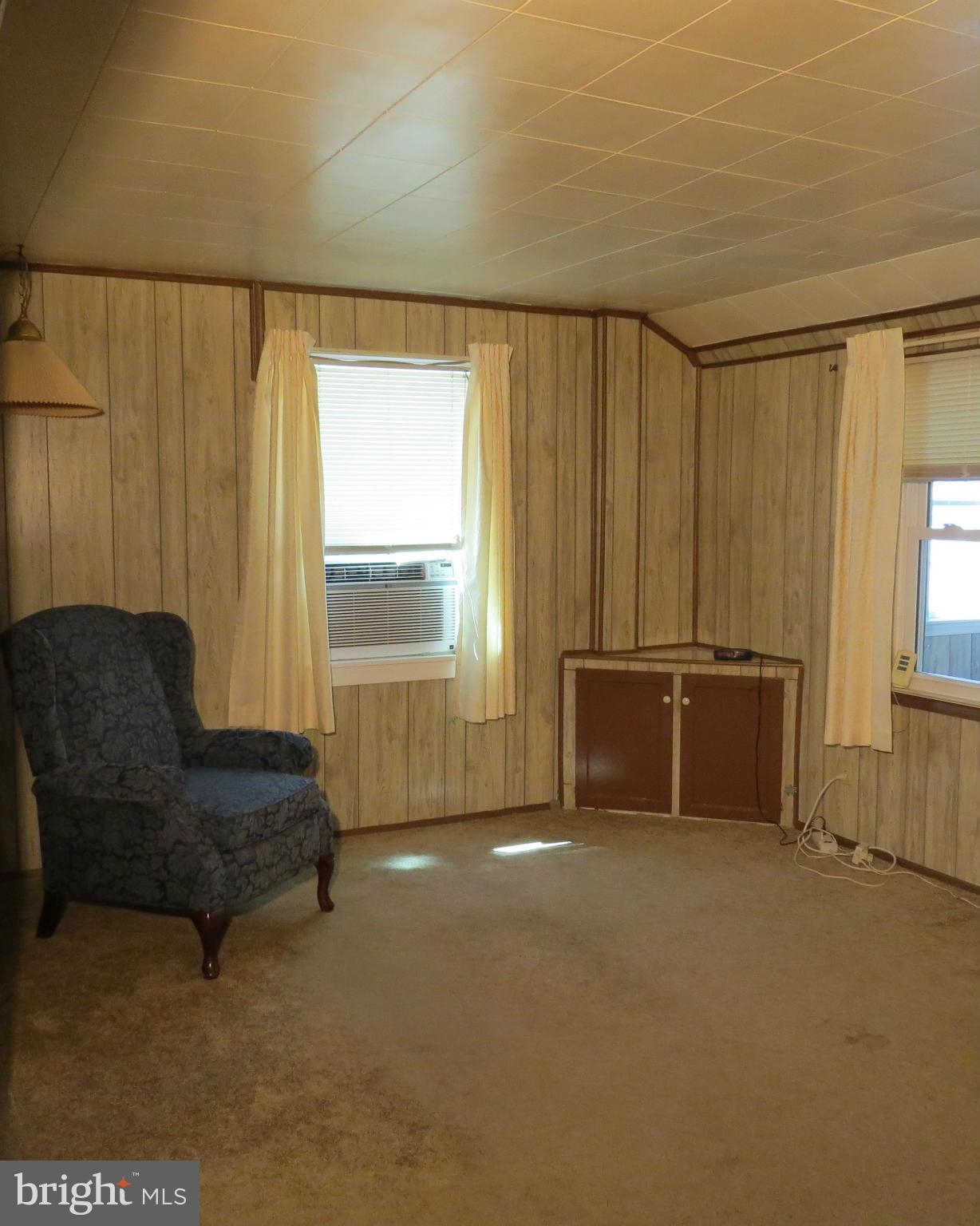 3401 Sollers Point Road Baltimore, MD 21222 - Photo 21 of 29 a living room with furniture and a window