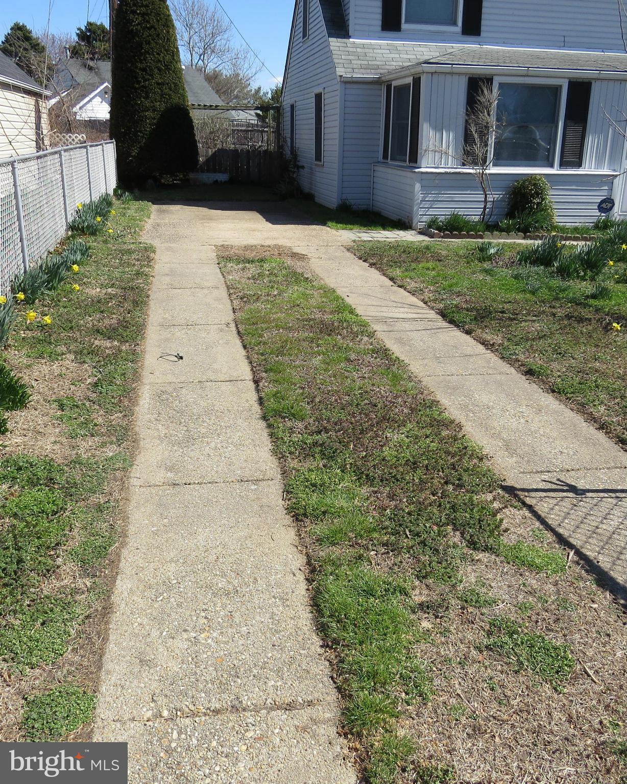 3401 Sollers Point Road Baltimore, MD 21222 - Photo 22 of 29 a front view of house with yard