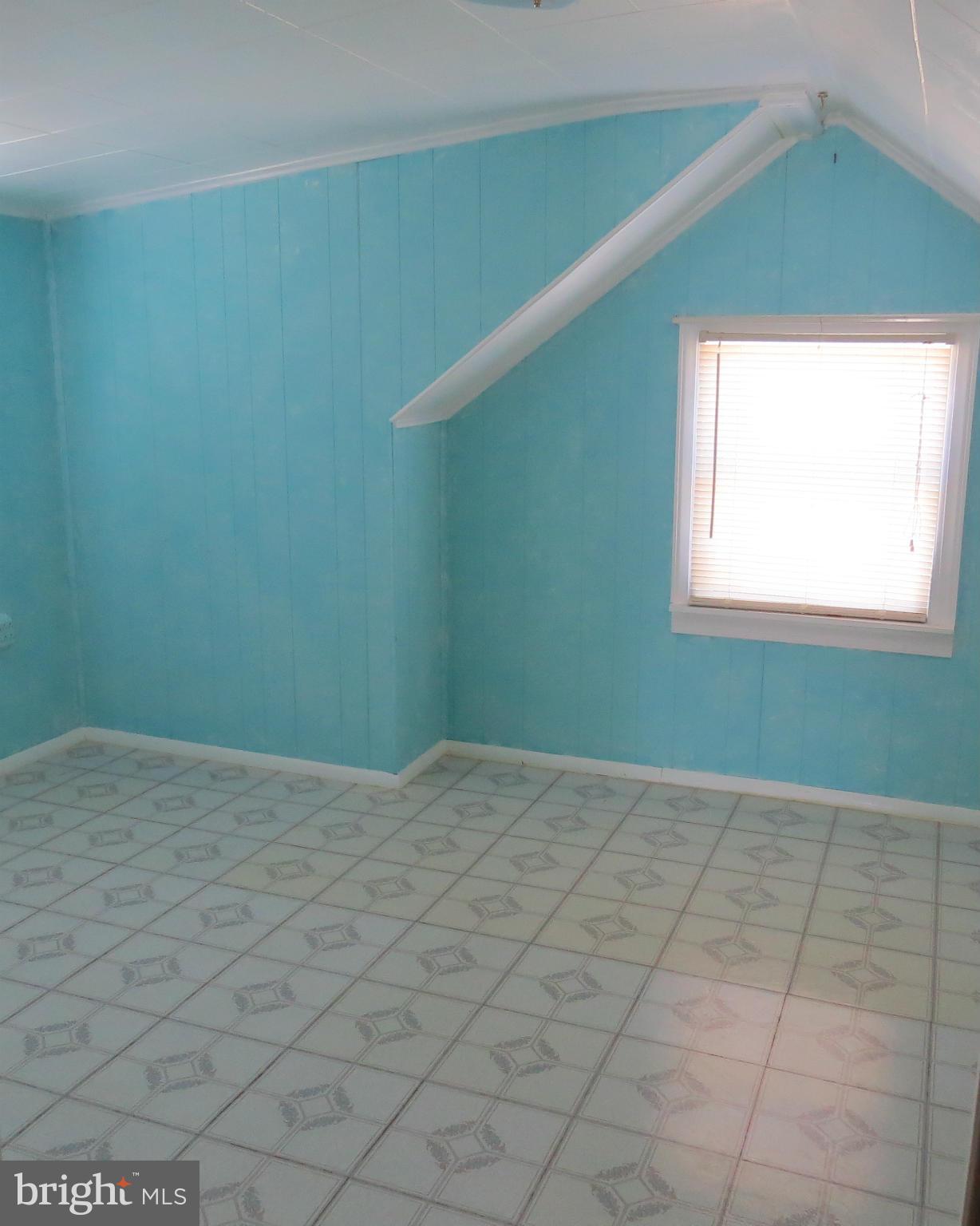 3401 Sollers Point Road Baltimore, MD 21222 - Photo 10 of 29 a view of an empty room with window