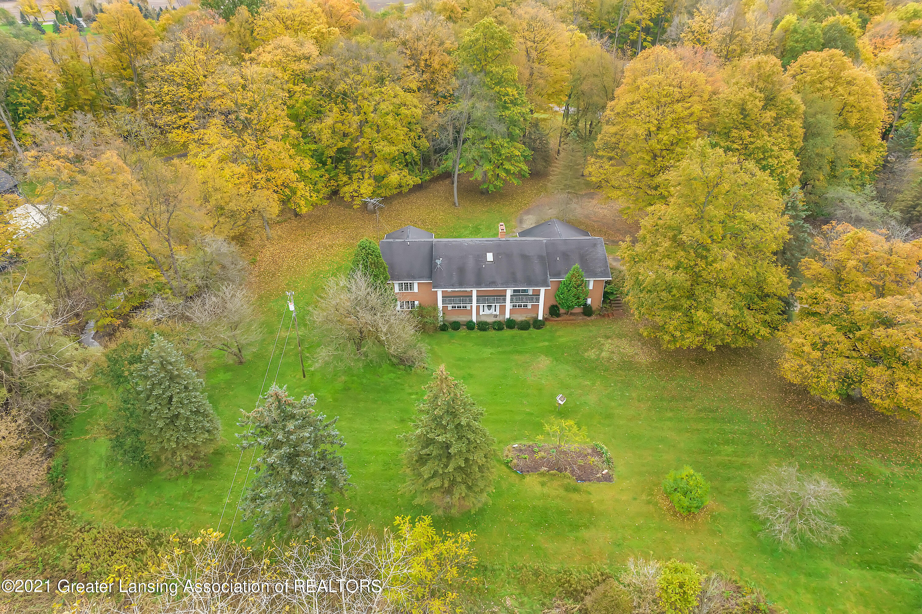 145 Three Oaks Road Okemos, MI 48864 - Photo 1 of 58 145 Three Oaks