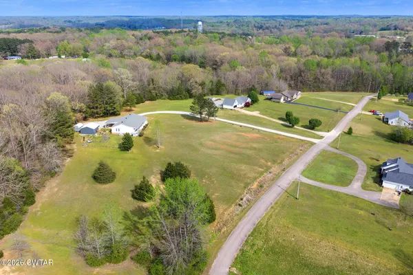 a view of a swimming pool and lounge chair