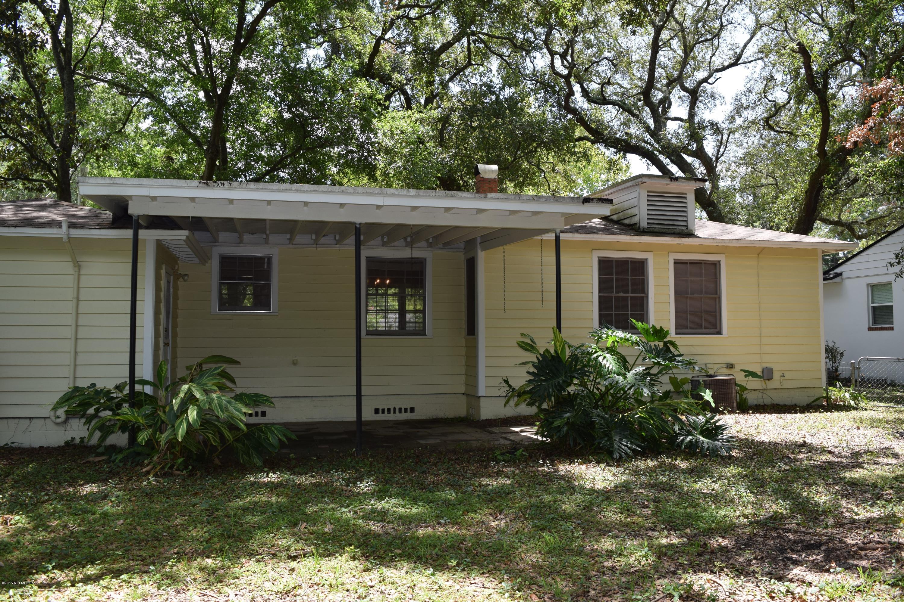 5604 Stetson Road Jacksonville, FL 32207 - Photo 18 of 18 a view of a house with a yard