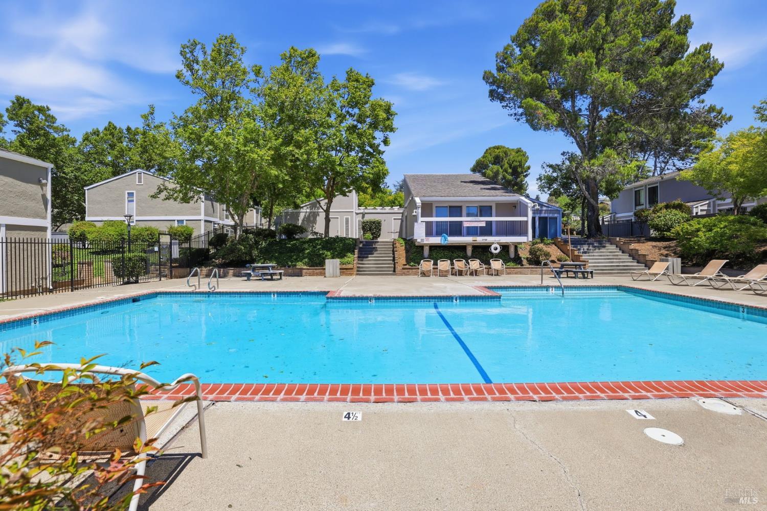 900 Southampton Road, Unit 169 Benicia, CA 94510 - Photo 21 of 21 an outdoor space with swimming pool and furniture
