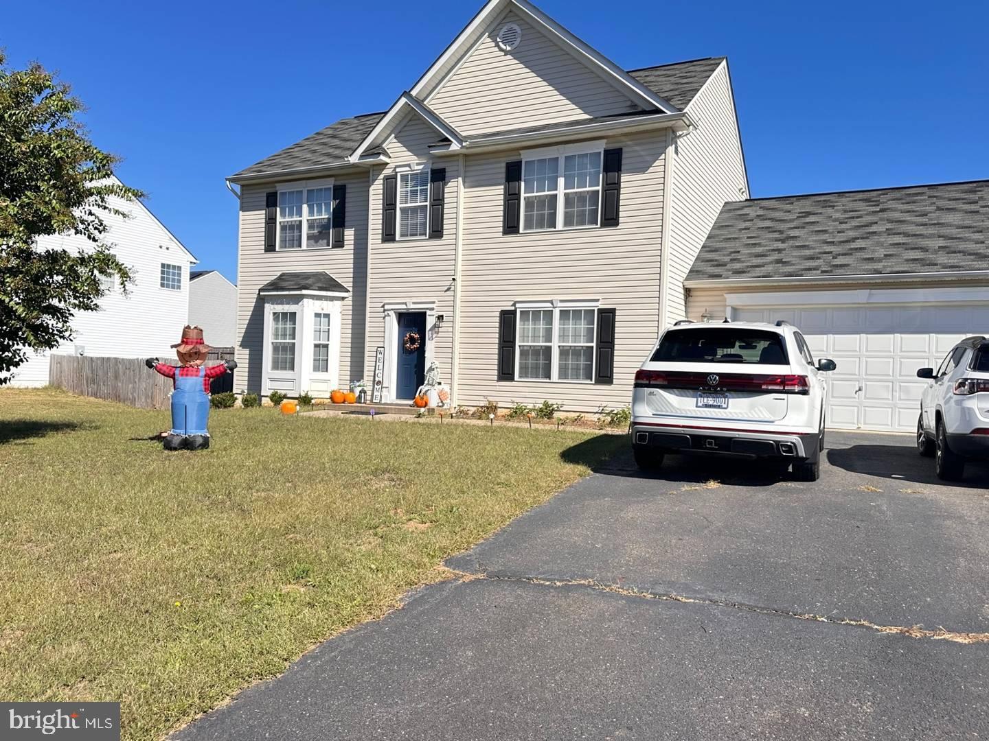 35391 Pheasant Ridge Road Locust Grove, VA 22508 - Photo 1 of 16 a car parked in front of a house