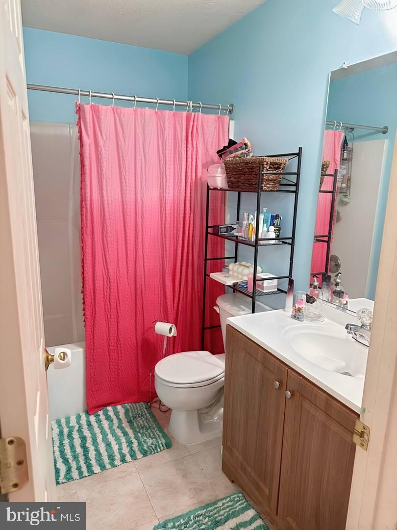 35391 Pheasant Ridge Road Locust Grove, VA 22508 - Photo 15 of 16 a bathroom with a sink toilet and shower