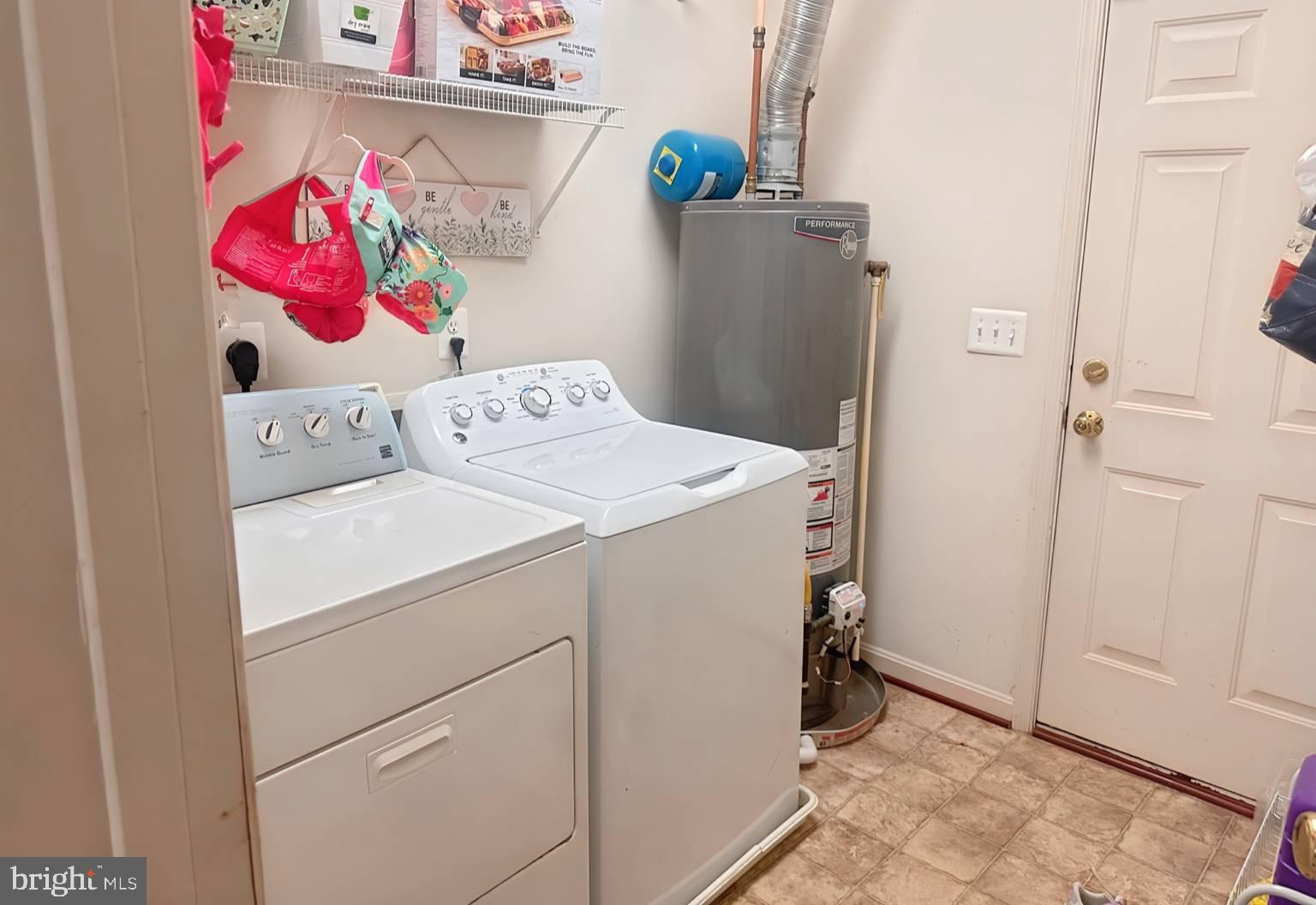 35391 Pheasant Ridge Road Locust Grove, VA 22508 - Photo 7 of 16 a utility room with dryer and washer